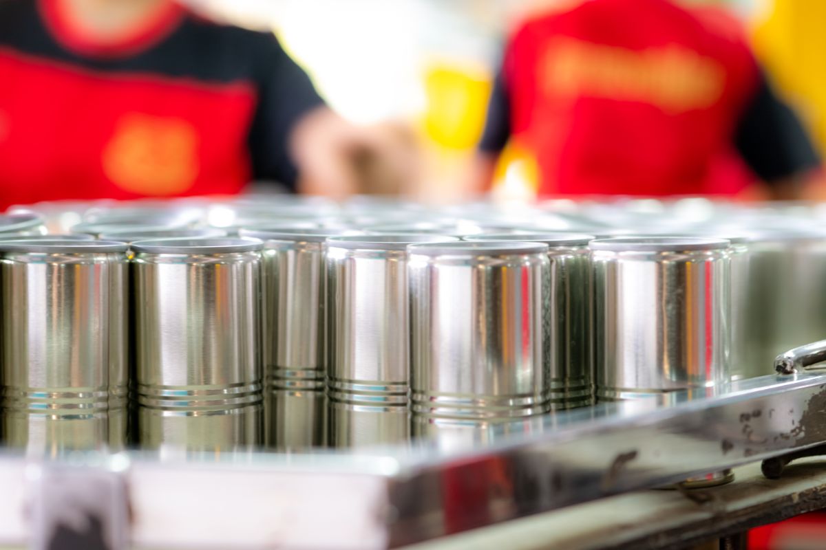 Canned goods ready to be labelled