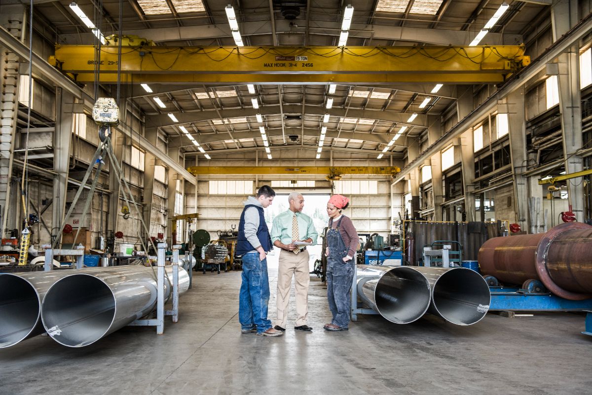 A team fixing the materials at an industrial facility